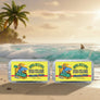 Two tins of Skully's Solid Cologne with a shark and palm tree design on a yellow label.