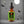 Skully's Zombie Brew beard oil bottle with green label on a white background